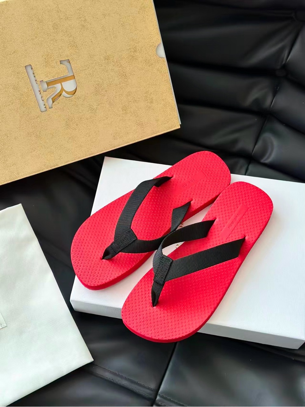 The Row Women’s Red Flip-Flop Sandals with Black Straps